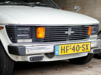 Suzuki SC100 Koplamp Grille